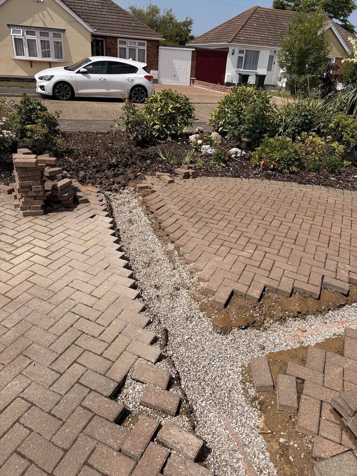 Drain excavation through block paving